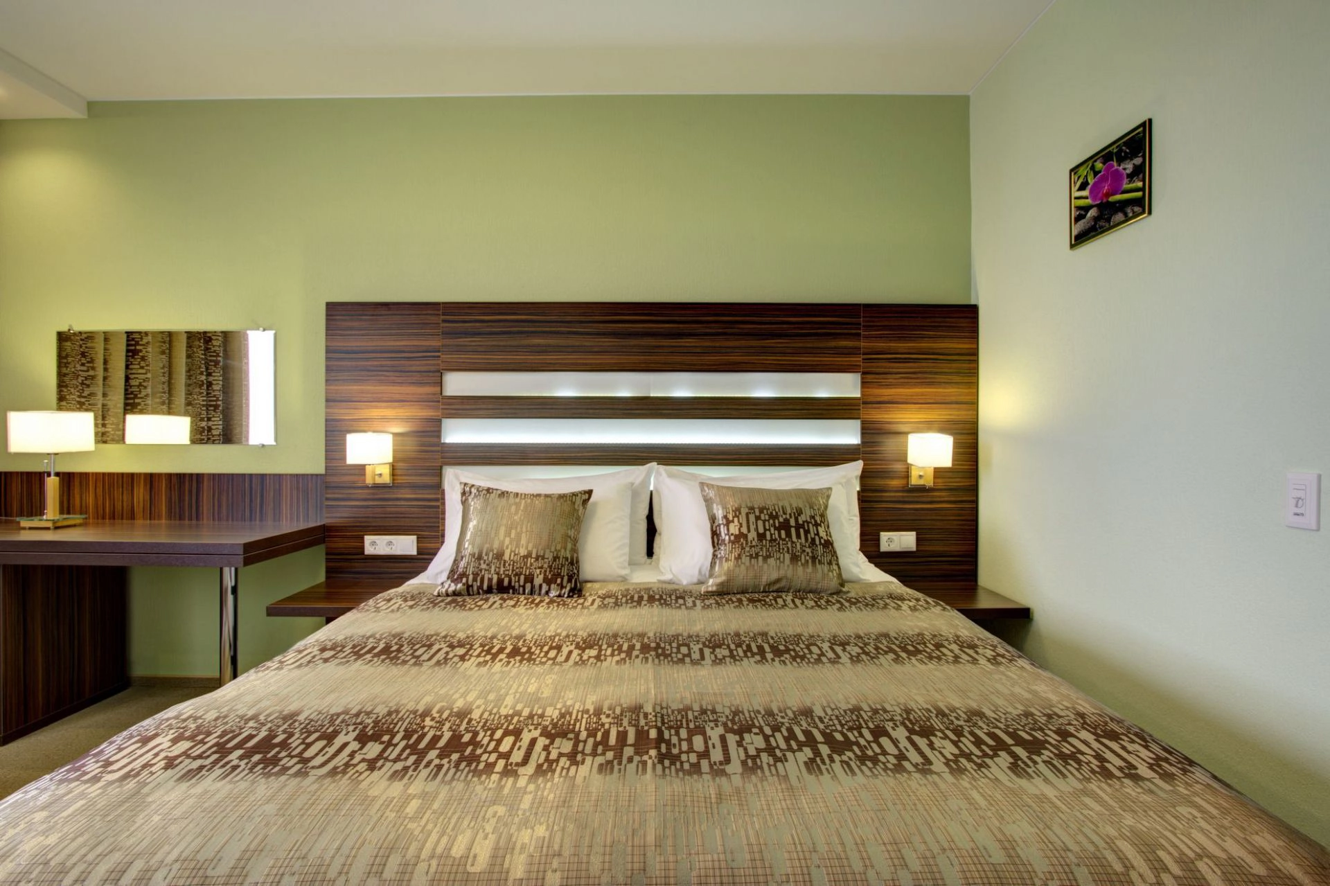 Кровать в номере Супериор в гостинице Альфа
